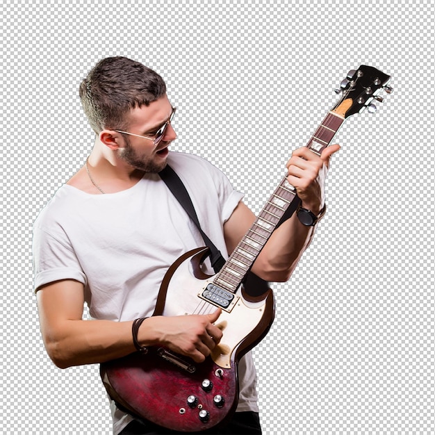 Guapo guitarrista tocando su guitarra eléctrica en pared negra