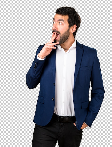 Gut aussehender Mann, der Überraschungsgeste macht