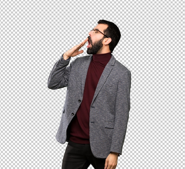 Gut aussehender Mann mit Brille weit offenem Mund mit der Hand gähnen und abdecken