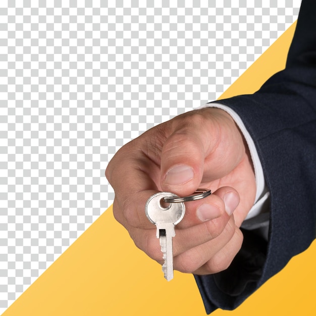 Hand, die einen Schlüssel hält