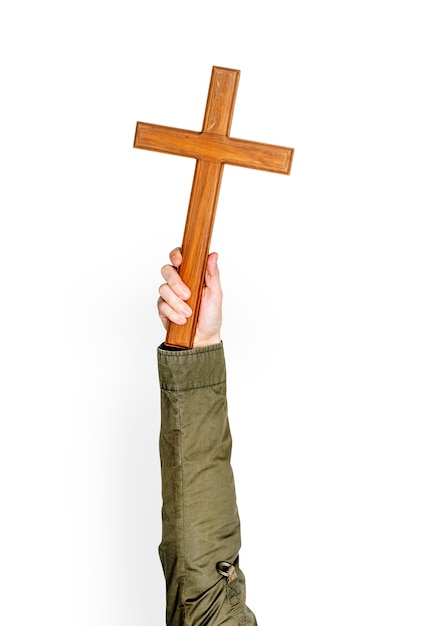 Hand hält Kreuz