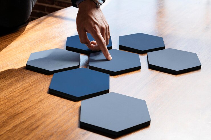 PSD hands pointing to connected hexagon cut out paper