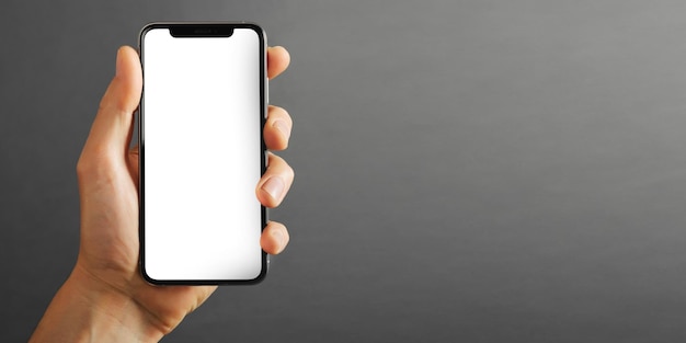 Handy auf dem grauen Hintergrund für Werbung zurück zur Schule