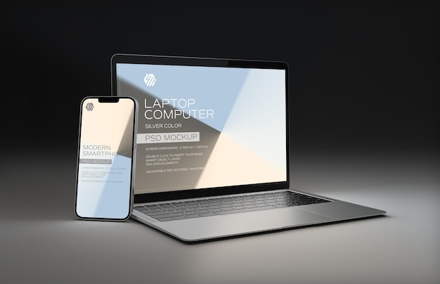 Handy und Laptop isoliert auf schwarzem Mockup