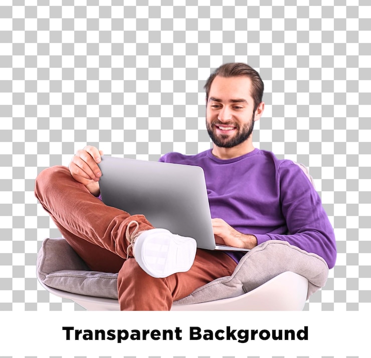 Happy Man Working on Laptop at Home