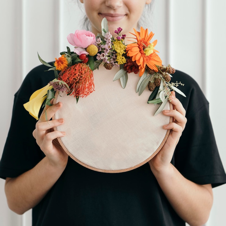 PSD happy woman holding a wooden frame mockup