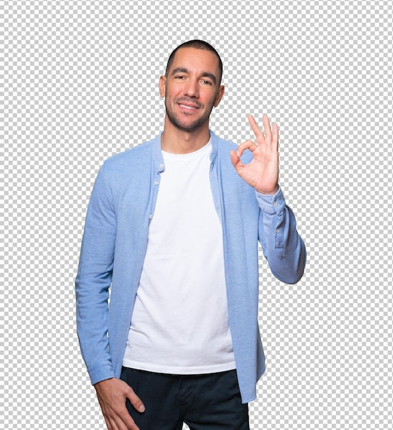 Heureux jeune homme faisant un bon geste