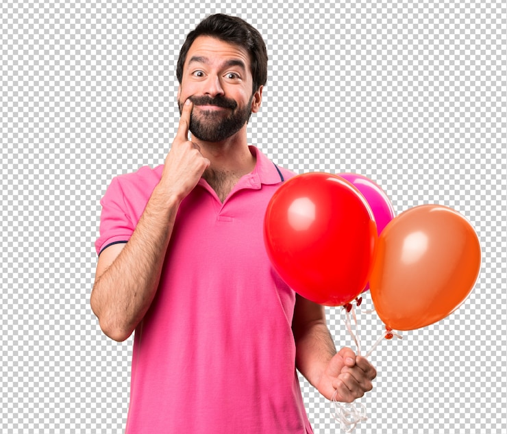 PSD heureux jeune homme tenant des ballons