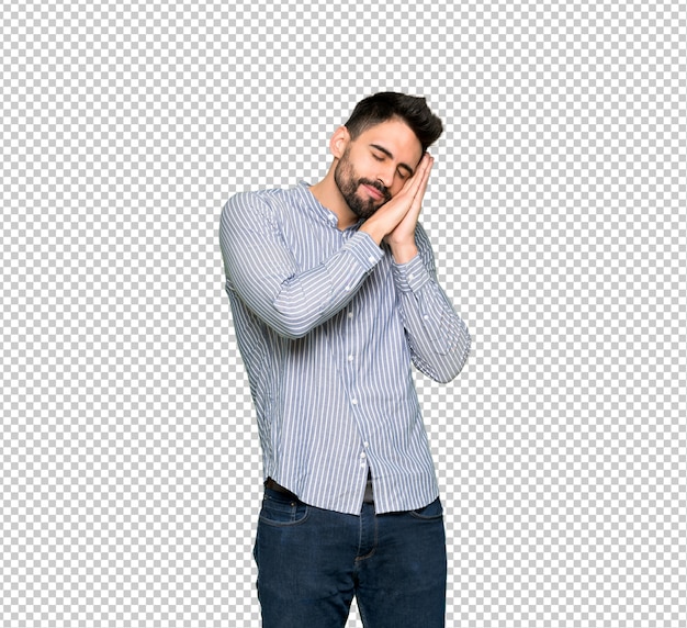 Hombre elegante con camisa haciendo gesto de sueño en expresión adorable