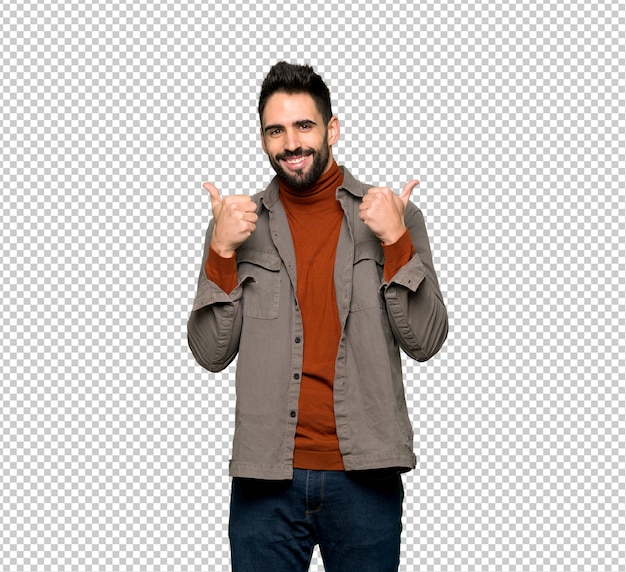 Hombre guapo con barba dando un pulgar hacia arriba gesto con ambas manos y sonriendo