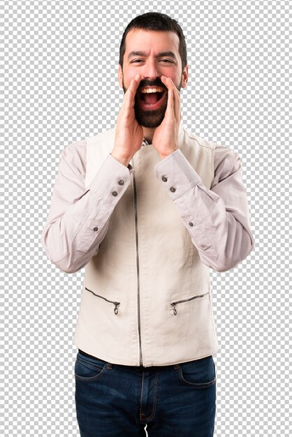 Hombre guapo con chaleco gritando