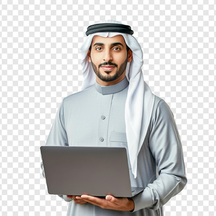 un hombre con hijab sostiene una computadora portátil