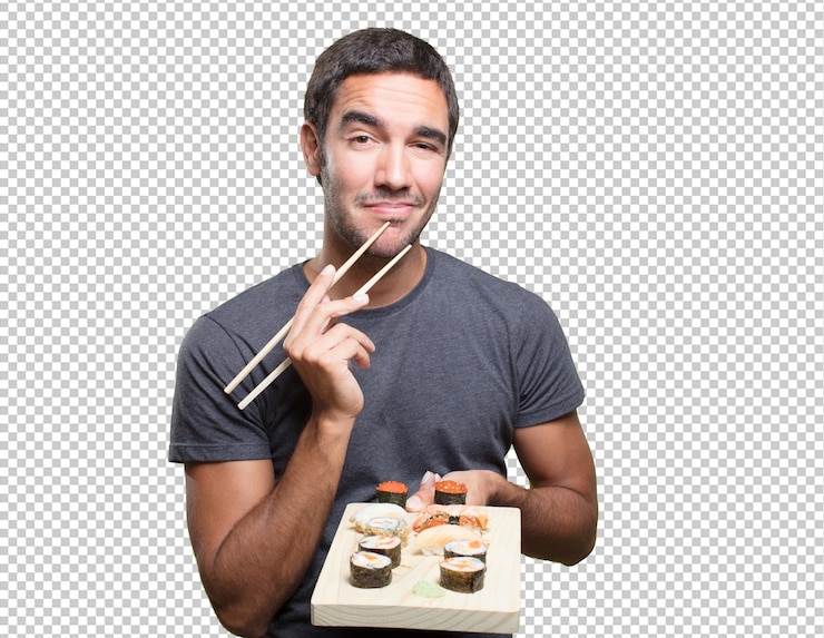 PSD hombre joven comiendo sushi