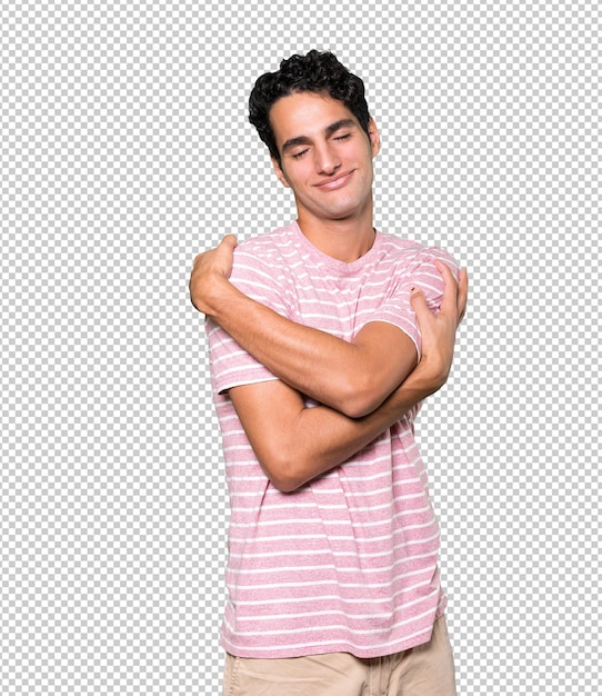 Hombre joven feliz haciendo un gesto de abrazo