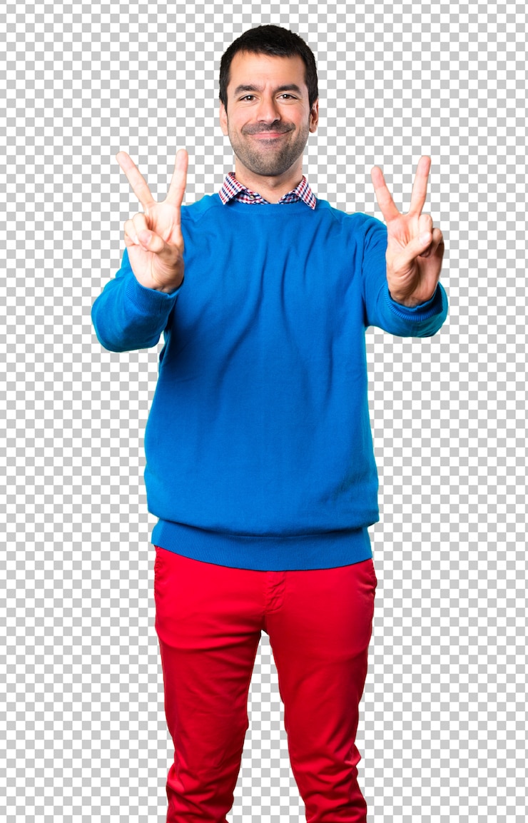 PSD hombre joven hermoso que hace gesto de la victoria