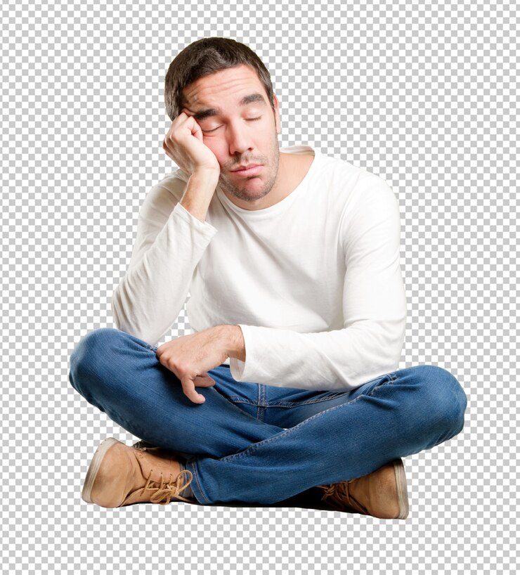 PSD hombre joven sentado con gesto cansado