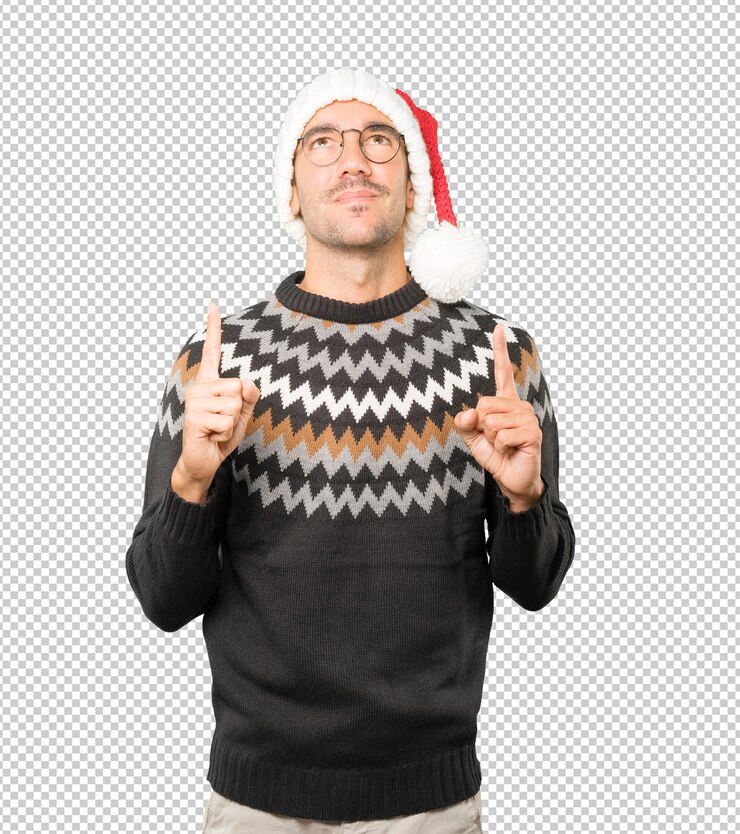 PSD hombre joven con un sombrero de navidad mientras gesticula aislado
