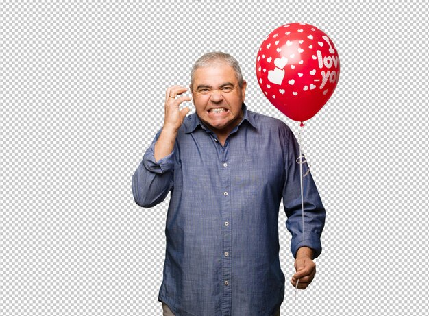 Hombre de mediana edad celebrando el día de san valentín enojado y molesto