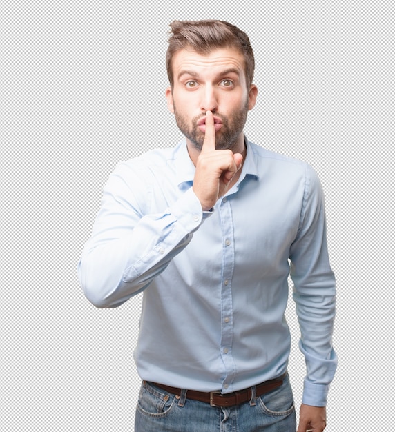 Hombre moderno haciendo gesto de silencio