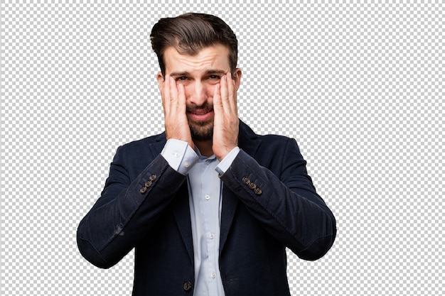 Hombre de negocios joven llorando