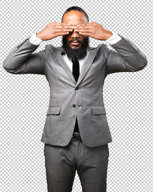 Hombre negro de negocios cubriendo su rostro