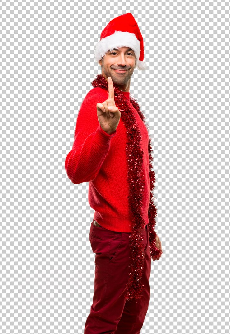 PSD hombre con ropa roja celebrando las fiestas navideñas mostrando y levantando un dedo