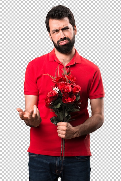 PSD homem bonito cansado segurando flores