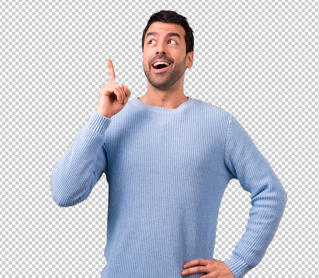 Homem bonito de pé e pensando uma idéia