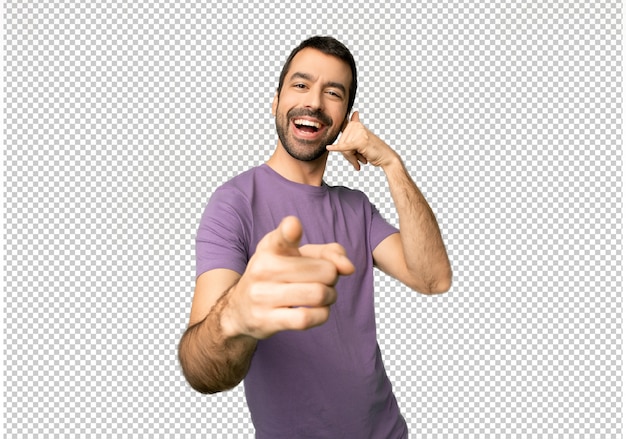 Homem bonito, fazendo gesto de telefone e apontando a frente