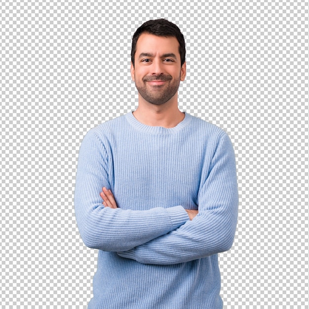 Homem bonito, mantendo os braços cruzados