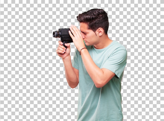 Homem bronzeado bonito jovem com uma câmera de cinema vintage