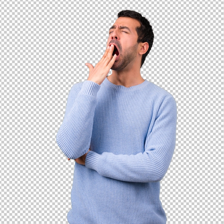 PSD homem com a camisola azul que boceja e que cobre a boca largamente aberta com a mão. expressão sonolenta