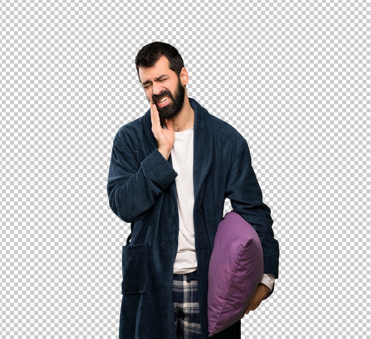 PSD homem com barba de pijama com dor de dente