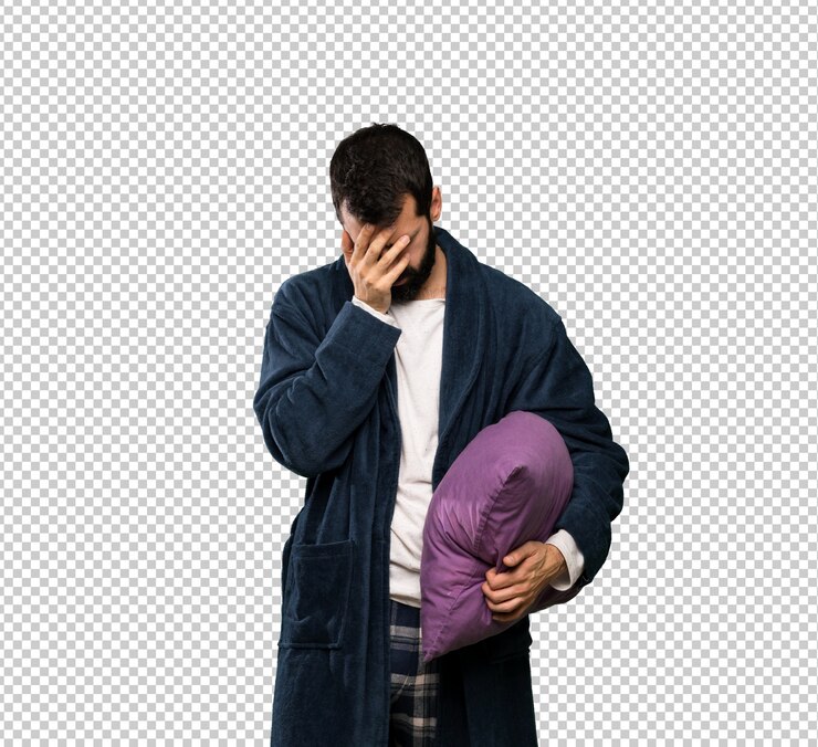 PSD homem com barba de pijama com expressão cansada e doente