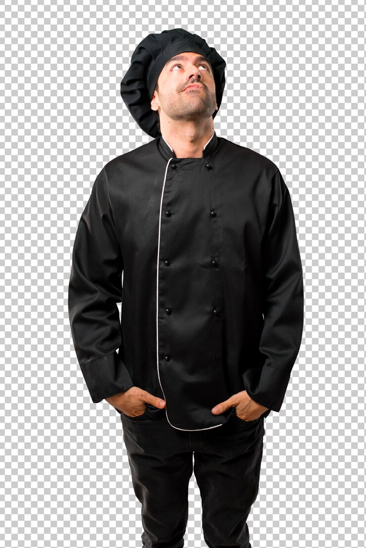 PSD homem de chef de uniforme preto ficar e olhando para cima com cara séria