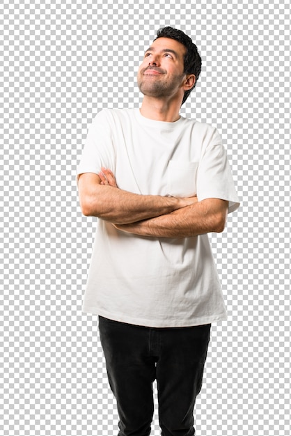 Homem jovem, com, camisa branca, levantar, e, olhar, enquanto, sorrindo