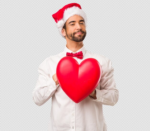 Homem jovem, desgastar, um, papai noel, chapéu, ligado, dia natal