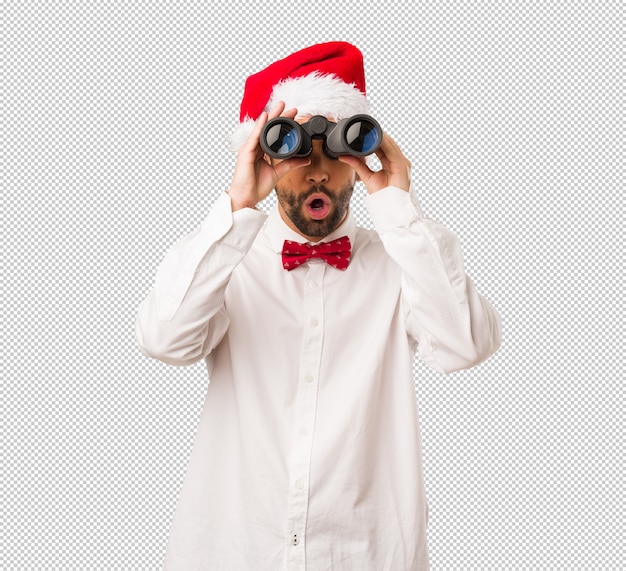 Homem jovem, desgastar, um, papai noel, chapéu, ligado, dia natal