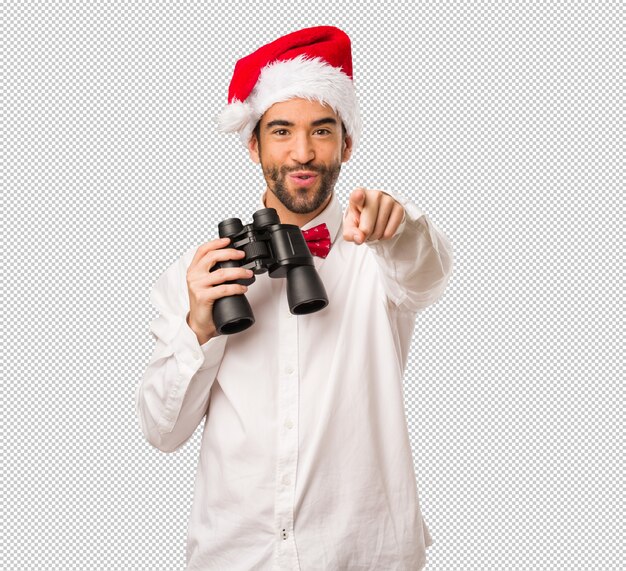 Homem jovem, desgastar, um, papai noel, chapéu, ligado, dia natal