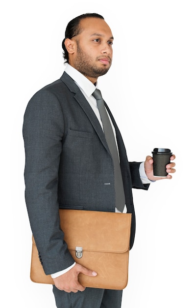 Homme d&#39;affaires indien tenant un sac et un café