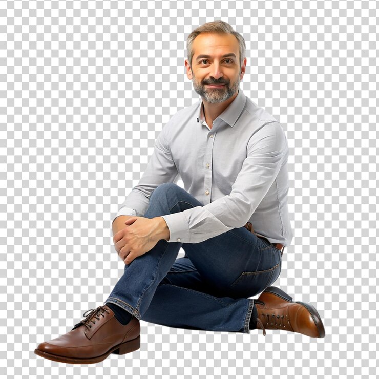 Un homme assis sur une chaise avec ses mains sur un fond transparent