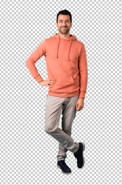 Homme, dans, a, rose, sweat-shirt, poser, à, bras hanche, et, rire, regarder, devant