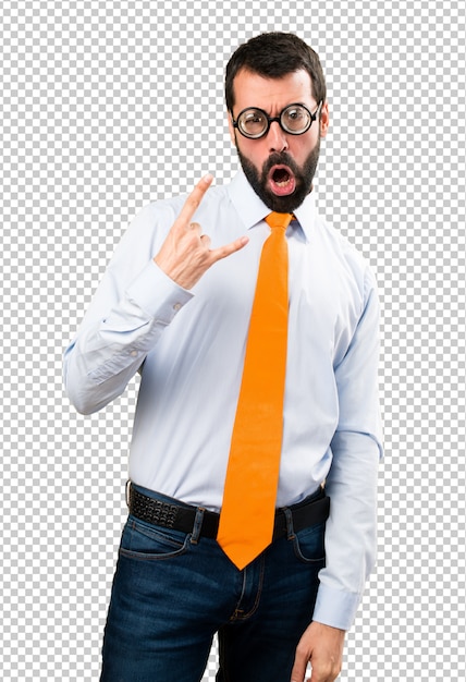 Homme Drôle Avec Des Lunettes Faisant Un Geste Rock