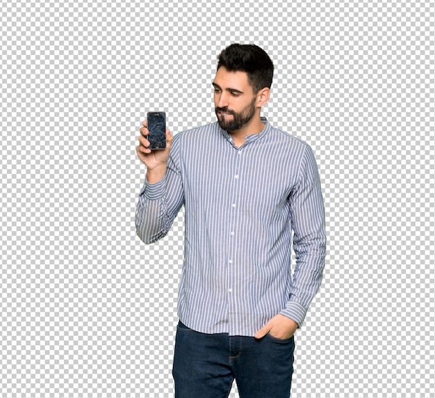 Homme élégant avec une chemise avec smartphone tenant brisé