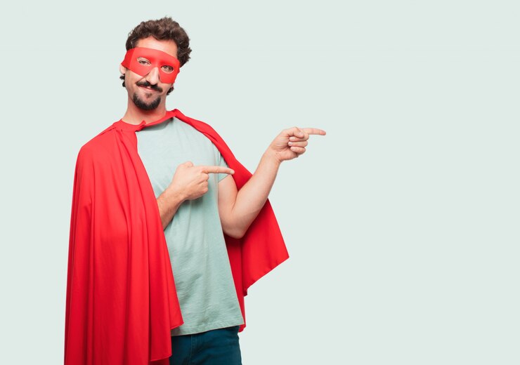 PSD homme fou comme un super héros souriant et pointant du côté des deux mains