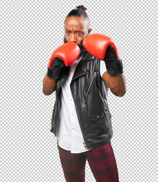 Homme noir se battre avec des gants de boxe