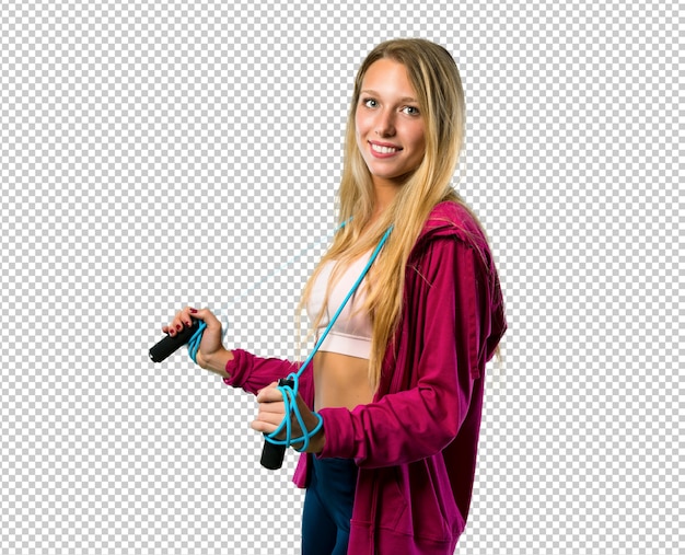 Hübsche Sportfrau mit springendem Seil