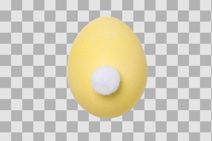 PSD huevo de pascua amarillo de png con cola de conejo aislada sobre fondo blanco