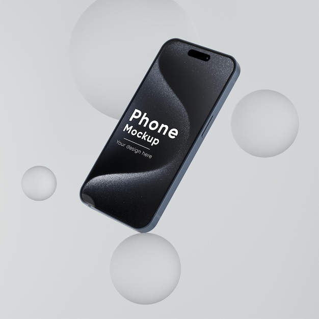 Il modello dell'iPhone 15 levita accanto alle sfere