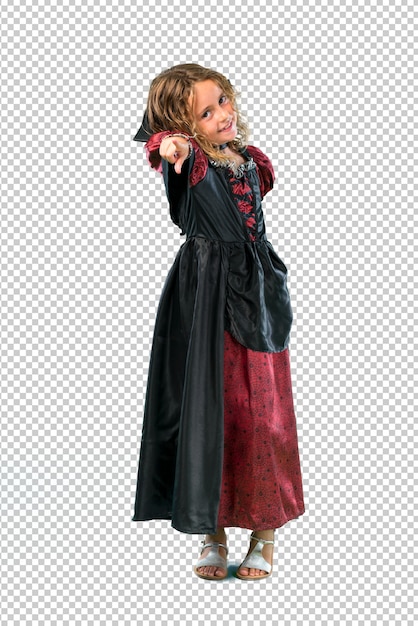Il ragazzino vestito da vampiro durante le vacanze di Halloween punta il dito contro di te